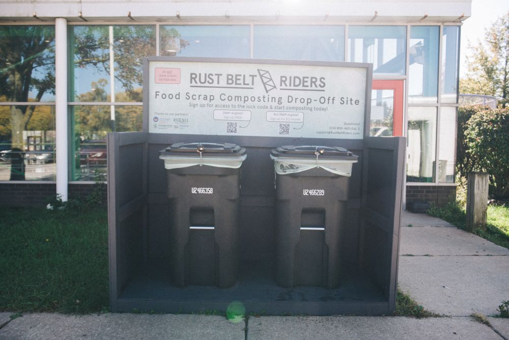 two composting drop-off bins