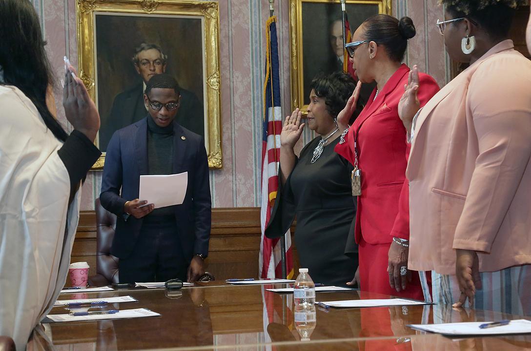 women taking pledge